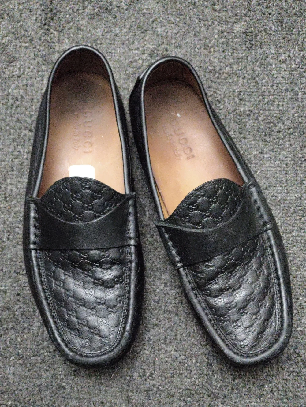 Gucci GG Black Embossed Leather Penny Loafers
